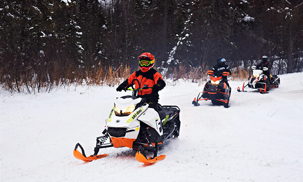 Local snowmobile trails remain closed due to mild early winter temperatures 