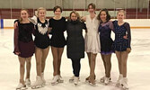 Members of the Sioux Lookout Skating Club’s Star 5+ group. From left: Aubrey Bates, Geneva Otto, Emma Bates, Coach Julia Withers, Ruth Broderick, Adelaide Meekis, and Savannah Otto.     Photo courtesy Becky Bates