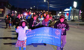 Sisters in Spirit Vigil participants march down Fourth Avenue in Sioux Lookout. - Tim Brody / Bulletin Photo