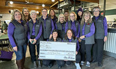 Skip to Equip organizers and SLMHC Foundation representatives proudly display the total raised at this year’s event, $95,000.   Tim Brody / Bulletin Photo