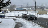 Vehicles traverse Wellington Street on Oct. 30.    Tim Brody / Bulletin Photo