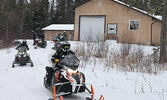 Snowarama participants began their fundraising ride from the Ojibway Power Toboggan Association clubhouse.    Tim Brody / Bulletin Photo