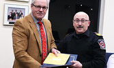 From left: Sioux Lookout Mayor Doug Lawrance recognized Sioux Lookout Fire Chief Rob Favot for 45 years of service with the Sioux Lookout Fire Department during a Municipal Council meeting on Dec. 18 last year. - Bulletin File Photo