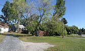 A large tree was uprooted, coming down on power lines on Third Avenue.     Tim Brody / Bulletin Photo