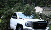 A downed tree on a vehicle on Drayton Road.     Tim Brody / Bulletin Photo