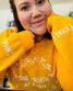 Chelsey Greig wearing the original sweater created with an uplifting message.      Chelsey Greig / Submitted Photo