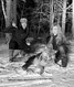 Amanda Lynn Mayhew (right) and her wolf hunting partner Jenny Tiboni pose with a wolf they hunted. - Jenny Tiboni / Submitted Photo