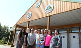 From left: TIC staff Jessica Crawford and Tayte Bowrun, Sam Hildebrand of Sam’s Fabrication, Blueberry Festival coordinator Hannah Willms, Chamber of Commerce representative Dori Hopko, Blueberry Festival coordinator Maddie Mesich, Blueberry Festival and 