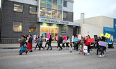 Take Back the Night participants march down Front Street.- Tim Brody / Bulletin Photo