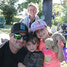 Foreground from left: Shaun Reid possess for a photo with his children Ryker and Perry at the Teddy Bear Picnic while visiting a booth to learn about x-rays where the family members learned from Sioux Lookout Meno Ya Win Health Centre Radiographer Arianna