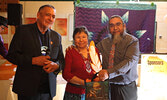 Lac Seul First Nation Chief Clifford Bull presents the Elders and/or Knowledge Keepers Award to Romaine Wesley and Victor Lyon.     Tim Brody / Bulletin Photo