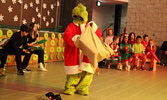 The Grinch (played by Connor Suprovich) packs up the Who’s presents with his dog Max.   Tim Brody / Bulletin Photo