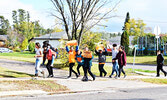 Students from Sioux Mountain Public School take part in Orange Shirt Day last year. - Bulletin File Photo