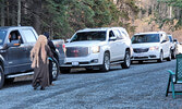 Participants line up for last year’s Trunk or Treat event.   Bulletin File Photo