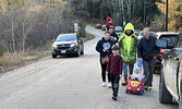 Trunk or Treat visitors leave the event with smiles on their faces.   Tim Brody / Bulletin Photo