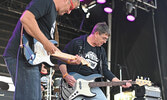 Paul Matousek (left) and Tommy Kuzemczak (right) performing on-stage at the Wake The Giant Music Festival. - Darren McChristie / Submitted Photos