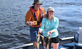 James Mansfield (left) and Carissa Mansfield with their day one catches, which totaled 7.50 pounds. - Jesse Bonello / Bulletin Photo