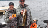 Jennifer and Brendan Sitar with their big fish of the day.     Photo courtesy Sioux Lookout Walleye Weekend