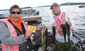 Elvis Trout (left) and Eric Bortlis with their catch.     Photo courtesy Sioux Lookout Walleye Weekend