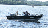 Walleye Weekend participants head back to the dock to weigh in their catch.     Tim Brody / Bulletin Photo