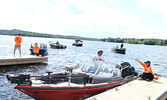 Fishing tournament participants arrive at the dock near the end of Day 2.     Tim Brody / Bulletin Photo