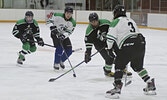 It was fast paced game at the Warriors Alumni Hockey Tournament on December 30. Both teams, a mix of current Warriors players and alumni, kept the pressure on and the final score of 8-7 showcased how evenly matched the teams were.    Mike Lawrence / Bulle