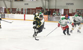 The Pros take on the Young Guns in a fast paced matchup. - Tim Brody / Bulletin Photo