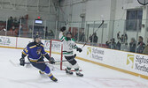 against the visiting Dryden High School Eagles at the Sioux Lookout Memorial Arena. Cole scored with less than 10 seconds left in the third period to give the Warriors a 5-4 win.   Tim Brody / Bulletin Photo