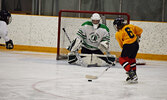 Kids had a blast scrimmaging with the Warriors, including trying to score on goaltender Jaden Marshall. - Jesse Bonello / Bulletin Photo