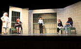 H.B. Hackett (centre, played by Anita Bruins-Burke) checks in on Esmerelda Quipp (second from right, played by Ashely Edwards), Penelope Farthington (far right, played by Kris Mancuso) Gladys Symmington-Bukovich (far left, played by Crystal Harrison Colli