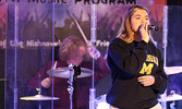 Vocalist McKenna Murphy (foreground) and drummer Eric Goretzki of Hot Mess practice for the upcoming Christmas Concert.     Tim Brody / Bulletin Photo